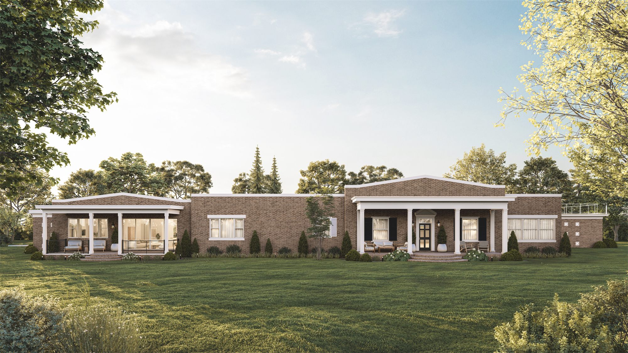 Hammen Residence: a long brick home with a new addition and covered porch