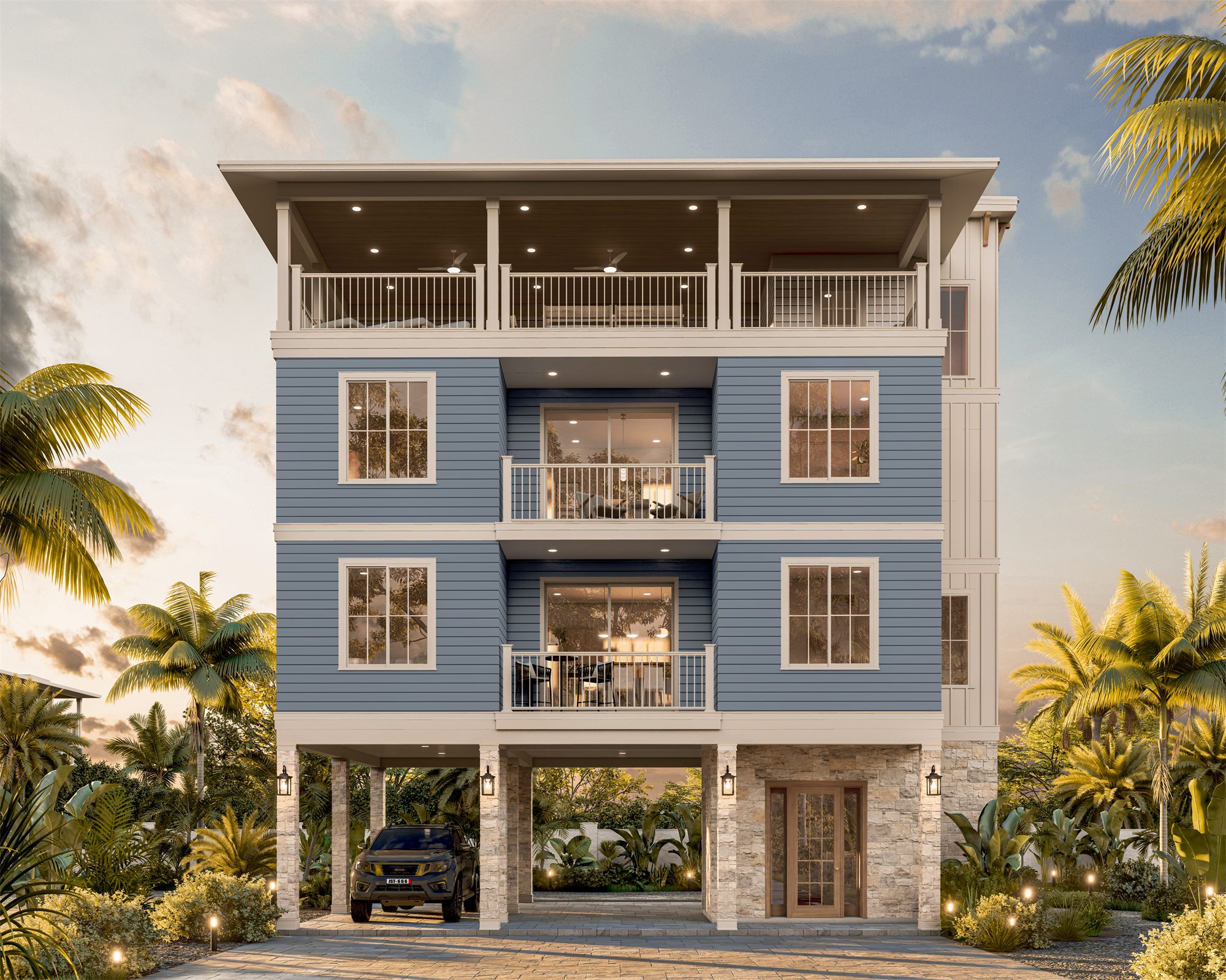 Treasure Island Duplex: an elevated coastal building with blue siding, stacked balconies, and parking below